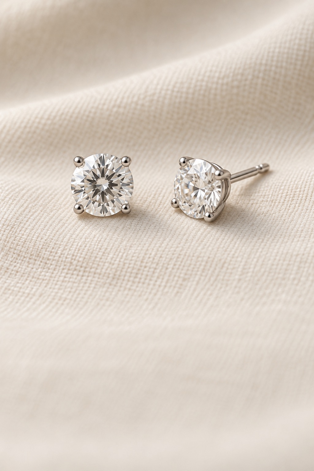 Diamond studs on soft ivory fabric